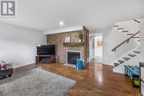 25 Green Pine Avenue, Springwater, ON - Indoor Photo Showing Living Room With Fireplace