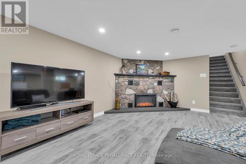 13722 Highway 41, Addington Highlands, ON - Indoor Photo Showing Living Room With Fireplace