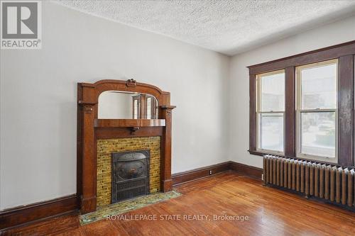 76 Spadina Avenue, Hamilton, ON - Indoor Photo Showing Other Room With Fireplace