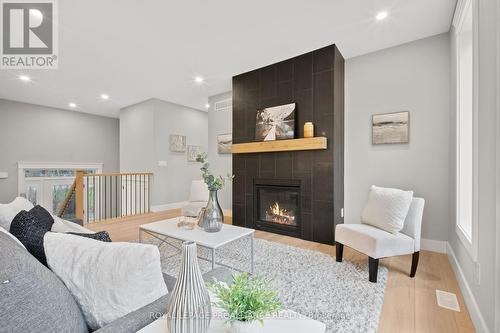 75 Riverside Boulevard, Trent Hills (Campbellford), ON - Indoor Photo Showing Living Room With Fireplace