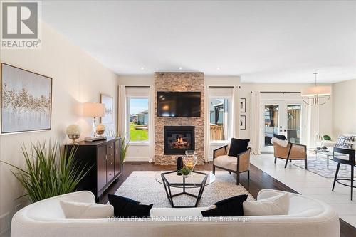 11 Gilbert Crescent, Prince Edward County, ON - Indoor Photo Showing Living Room With Fireplace