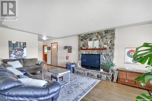 2504 14Th Street E, Saskatoon, SK - Indoor Photo Showing Living Room With Fireplace