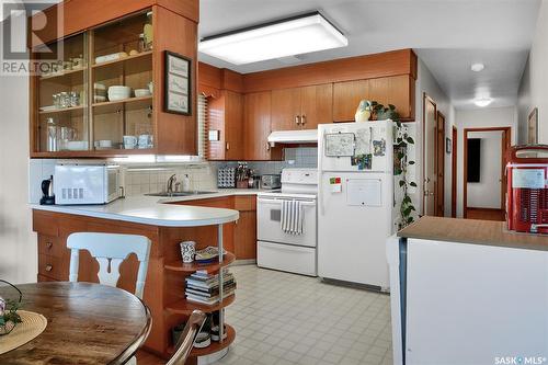 2504 14Th Street E, Saskatoon, SK - Indoor Photo Showing Kitchen With Double Sink