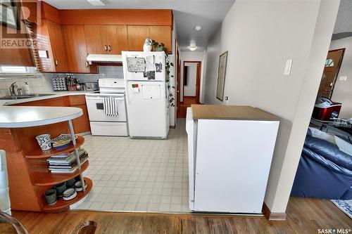 2504 14Th Street E, Saskatoon, SK - Indoor Photo Showing Kitchen With Double Sink