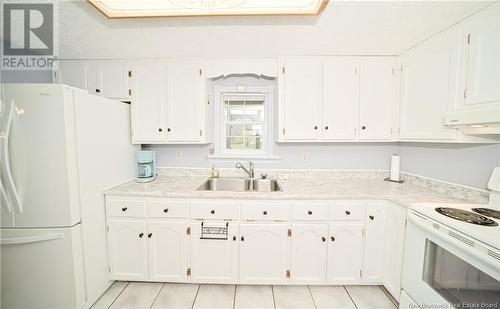66 Nevers Road, Lincoln, NB - Indoor Photo Showing Kitchen With Double Sink