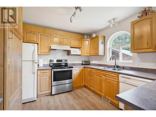 790 Spruce Street, Blue River, BC - Indoor Photo Showing Kitchen With Double Sink