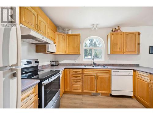 790 Spruce Street, Blue River, BC - Indoor Photo Showing Kitchen With Double Sink