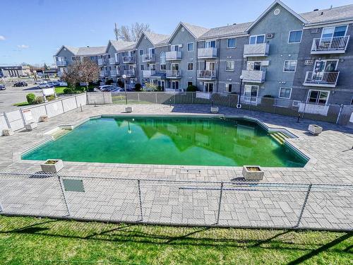Vue d'ensemble - 212-100 Rue Chopin, Repentigny (Repentigny), QC - Outdoor With In Ground Pool