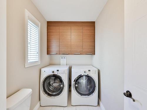 Salle de lavage - 512 Rue Laurent-O.-David, Boisbriand, QC - Indoor Photo Showing Laundry Room