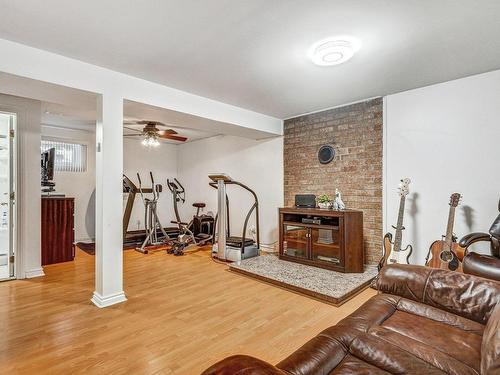 Family room - 981 Rue Dion, Longueuil (Greenfield Park), QC - Indoor Photo Showing Gym Room