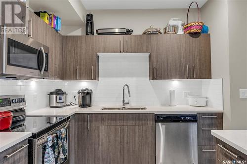 108 142 Pawlychenko Lane, Saskatoon, SK - Indoor Photo Showing Kitchen With Stainless Steel Kitchen With Double Sink