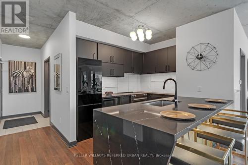 710 - 400 Wellington Street W, Toronto, ON - Indoor Photo Showing Kitchen With Upgraded Kitchen