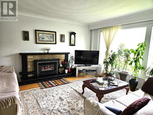 201 Bishop Avenue, Toronto, ON - Indoor Photo Showing Living Room With Fireplace