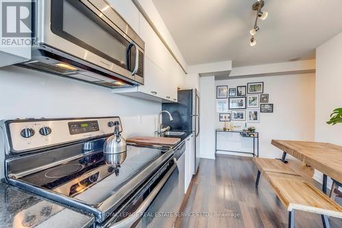 1527 - 38 Joe Shuster Way, Toronto, ON - Indoor Photo Showing Kitchen With Stainless Steel Kitchen