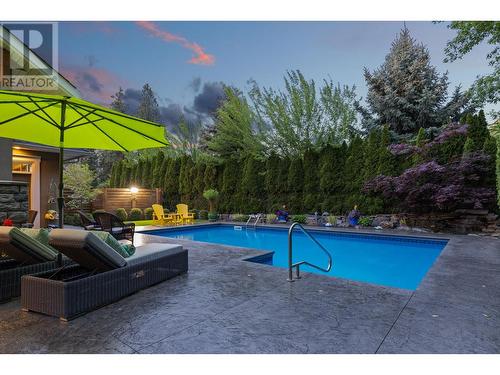 679 Quarry Avenue, Kelowna, BC - Outdoor With In Ground Pool With Backyard