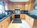 9 1St Street E, Battleford, SK  - Indoor Photo Showing Kitchen With Double Sink 