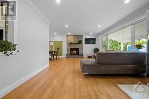 27 Beaverton Avenue, Nepean, ON - Indoor Photo Showing Other Room With Fireplace