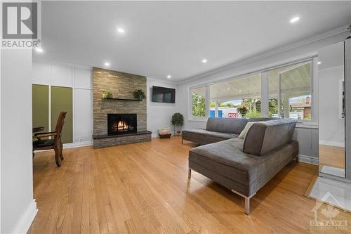 27 Beaverton Avenue, Nepean, ON - Indoor Photo Showing Living Room With Fireplace