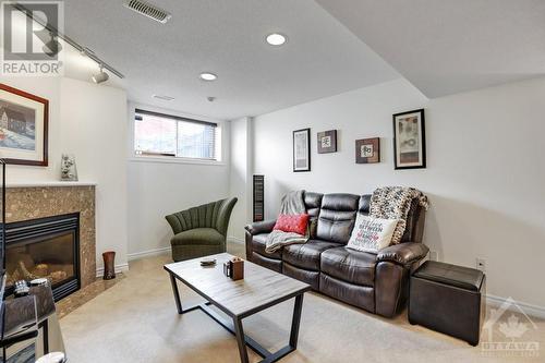 145 Saddlesmith Circle, Kanata, ON - Indoor Photo Showing Living Room With Fireplace