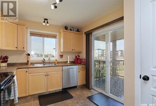 #16 4640 Harbour Landing Drive, Regina, SK - Indoor Photo Showing Kitchen With Double Sink