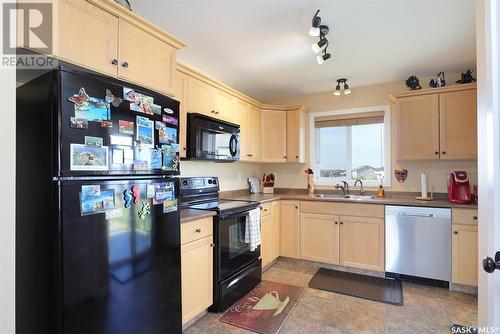 #16 4640 Harbour Landing Drive, Regina, SK - Indoor Photo Showing Kitchen With Double Sink