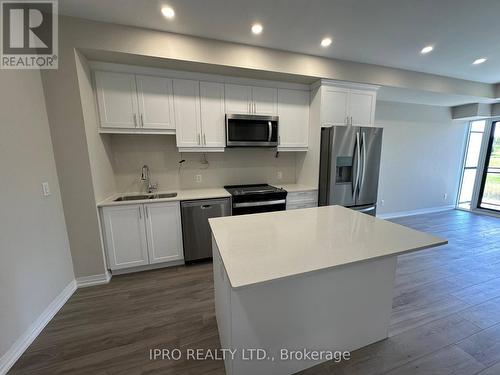 130 - 50 Herrick Avenue, St. Catharines, ON - Indoor Photo Showing Kitchen With Double Sink With Upgraded Kitchen