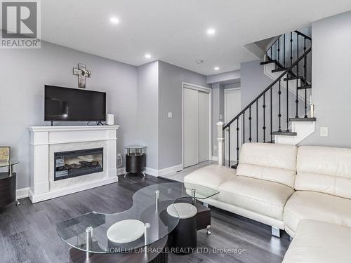 3360 Redpath Circle, Mississauga, ON - Indoor Photo Showing Living Room With Fireplace