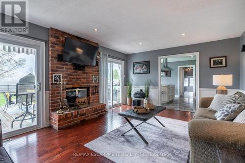 8735 Milburough Line, Milton, ON - Indoor Photo Showing Living Room With Fireplace