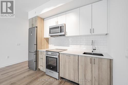 407 - 1195 The Queensway Street, Toronto, ON - Indoor Photo Showing Kitchen With Upgraded Kitchen