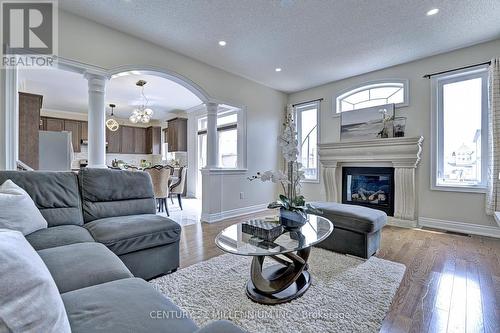 11 Maybeck Drive, Brampton, ON - Indoor Photo Showing Living Room With Fireplace