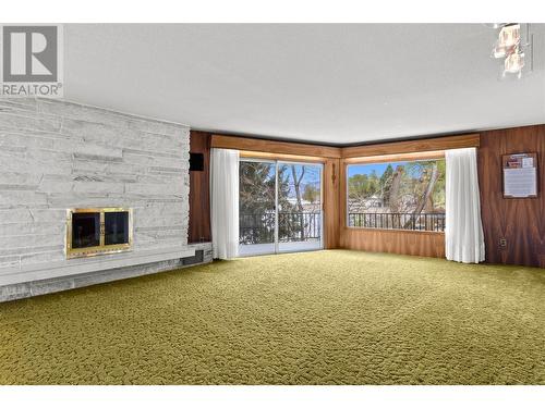 3726 Zinck Road, Scotch Creek, BC - Indoor Photo Showing Living Room With Fireplace