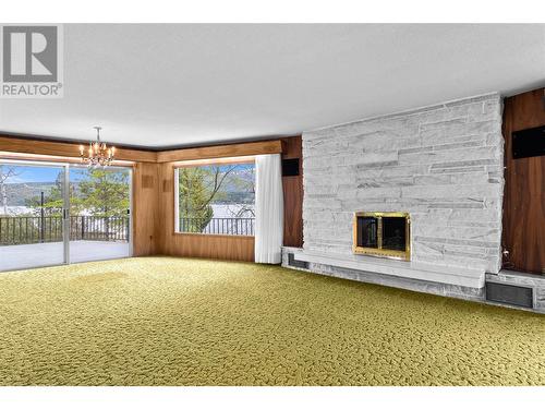 3726 Zinck Road, Scotch Creek, BC - Indoor Photo Showing Living Room With Fireplace