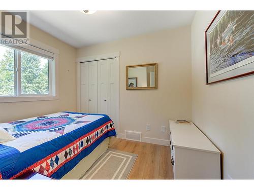 7992 Alpine Road, Kelowna, BC - Indoor Photo Showing Bedroom