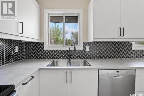 56 120 Acadia Drive, Saskatoon, SK - Indoor Photo Showing Kitchen With Double Sink
