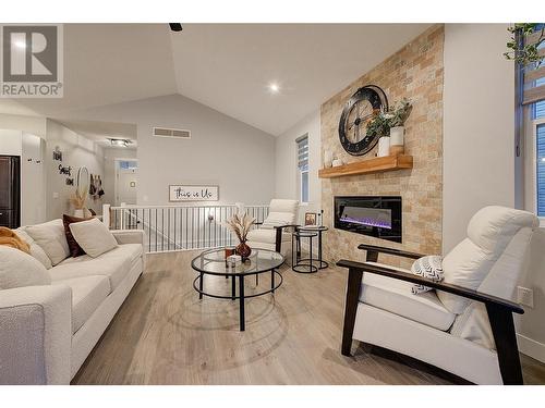 2037 Elkridge Drive, West Kelowna, BC - Indoor Photo Showing Living Room With Fireplace