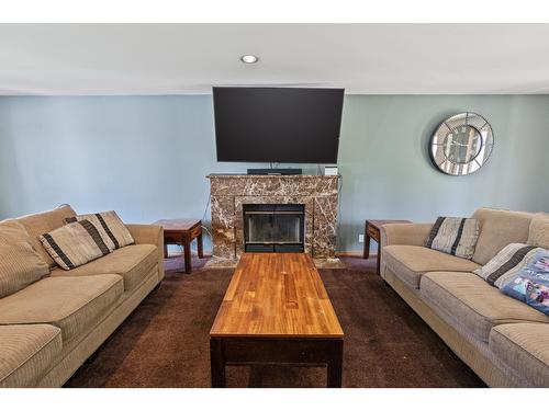 2642 Norns Creek Road, Castlegar, BC - Indoor Photo Showing Living Room With Fireplace