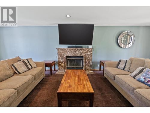 2642 Norns Creek Road, Castlegar, BC - Indoor Photo Showing Living Room With Fireplace