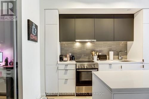 406 - 7 Smith Crescent, Toronto, ON - Indoor Photo Showing Kitchen With Upgraded Kitchen