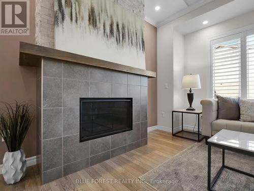 13 - 3426 Castle Rock Place, London, ON - Indoor Photo Showing Living Room With Fireplace