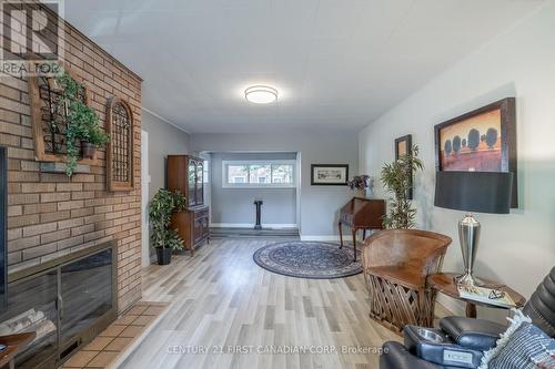 363 Ridout Street S, London, ON - Indoor Photo Showing Living Room With Fireplace
