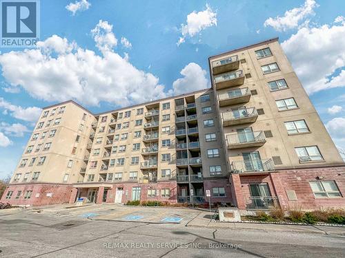 301 - 7405 Goreway Drive, Mississauga, ON - Outdoor With Balcony With Facade