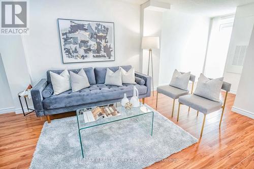 301 - 7405 Goreway Drive, Mississauga, ON - Indoor Photo Showing Living Room