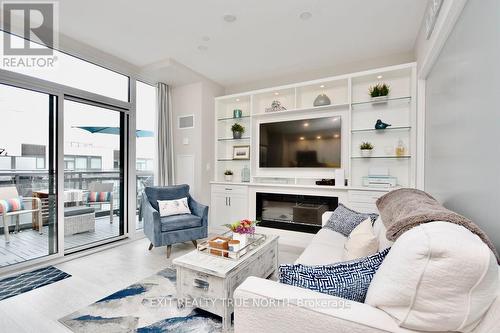 C404 - 301 Sea Ray Avenue, Innisfil, ON - Indoor Photo Showing Living Room