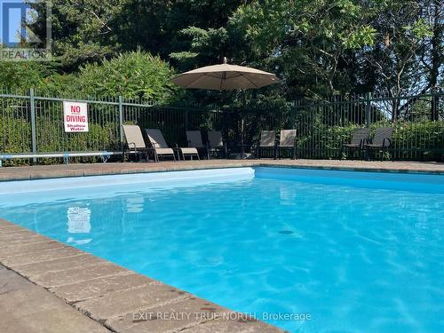103 - 25 Meadow Lane, Barrie, ON - Outdoor With In Ground Pool