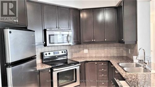 2307 - 80 Absolute Avenue, Mississauga, ON - Indoor Photo Showing Kitchen With Double Sink With Upgraded Kitchen