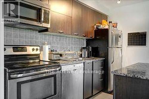 407 - 38 Joe Shuster Way, Toronto, ON - Indoor Photo Showing Kitchen