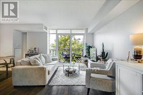 407 - 38 Joe Shuster Way, Toronto, ON - Indoor Photo Showing Living Room