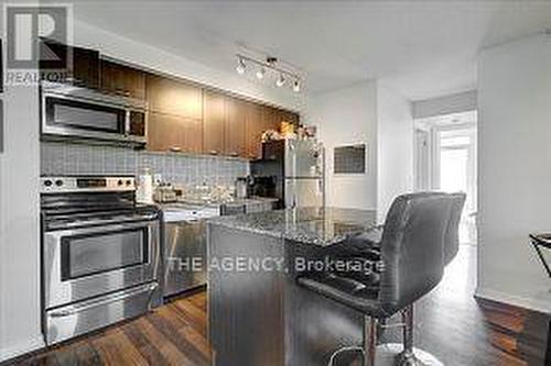 407 - 38 Joe Shuster Way, Toronto, ON - Indoor Photo Showing Kitchen With Upgraded Kitchen