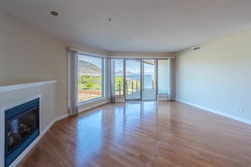 507-250 Marina Way, Penticton, BC - Indoor With Fireplace