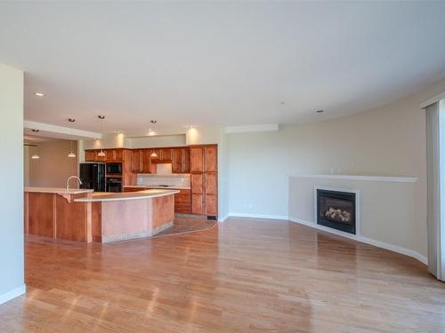 507-250 Marina Way, Penticton, BC - Indoor With Fireplace